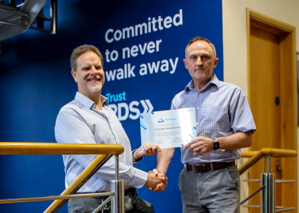 Andrew Bramley receiving certification from Panorama representative Mark Green