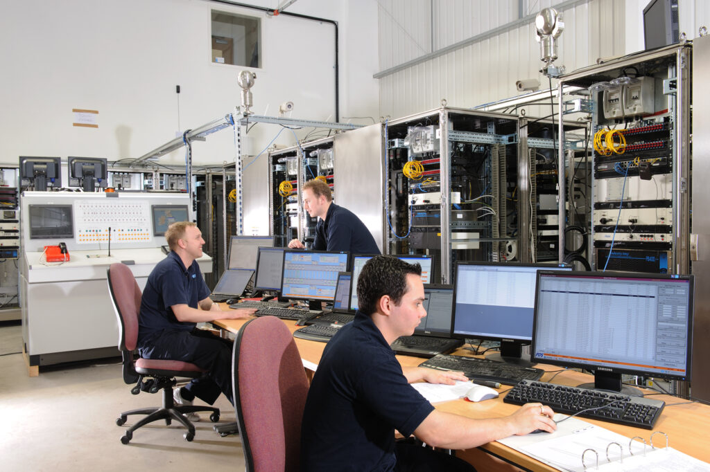 PDS employees testing SCADA Systems. System Support