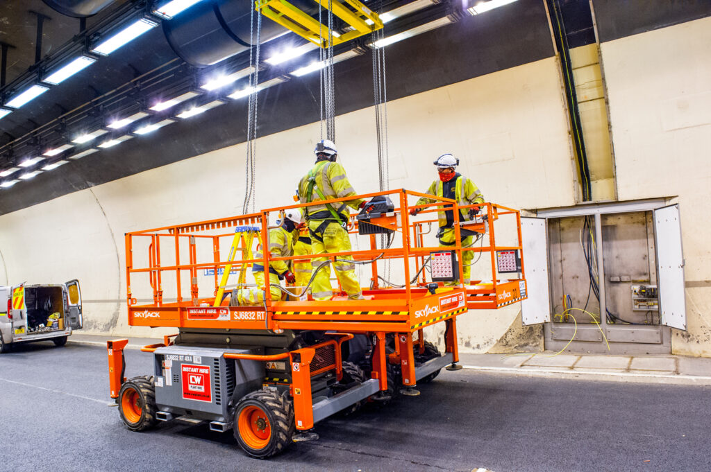 Staff on a scissor lift